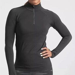 NWT Athleta Momentum Seamless Half zip, size Medium.